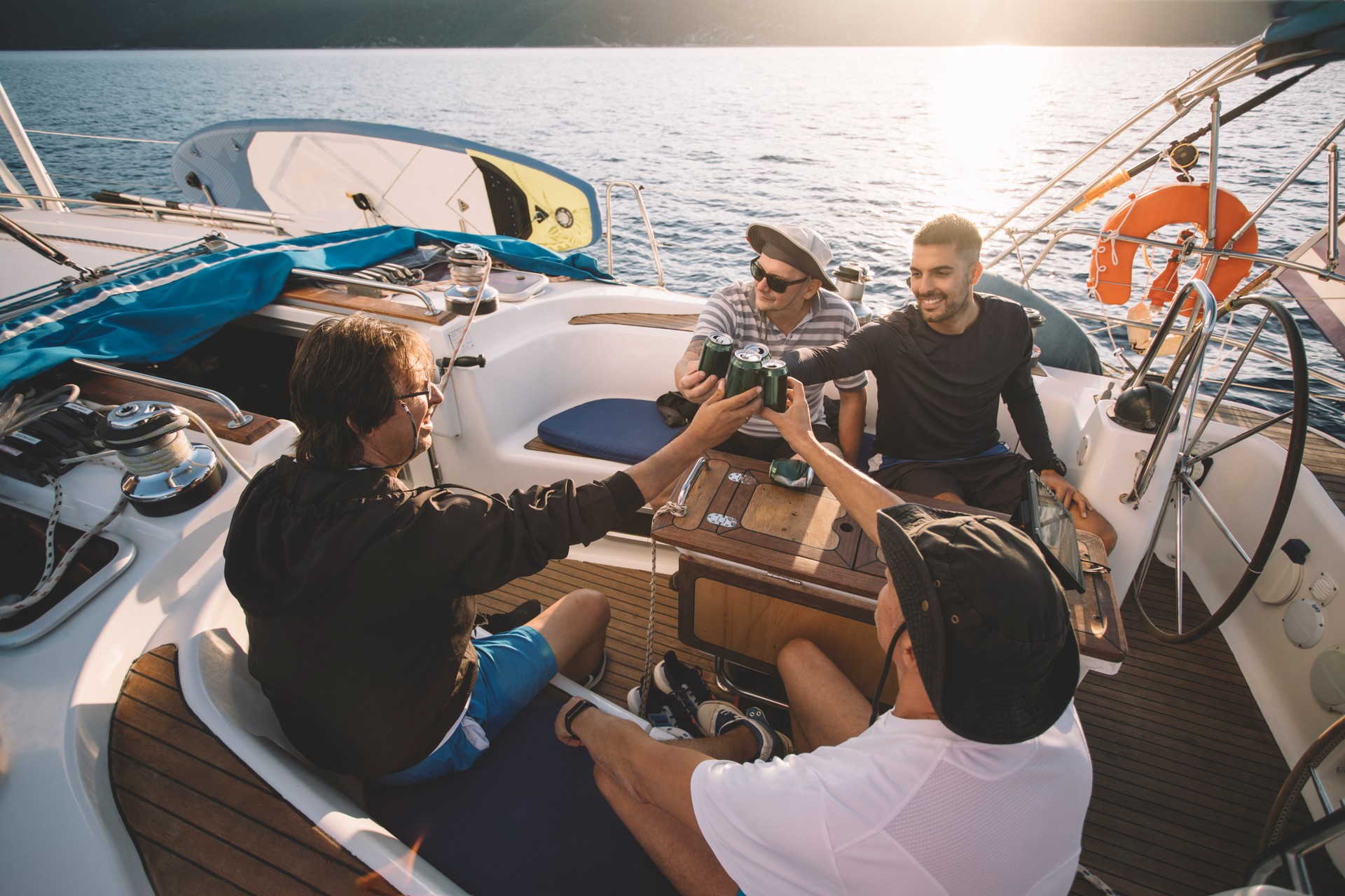 Friends enjoying time together on sailboat