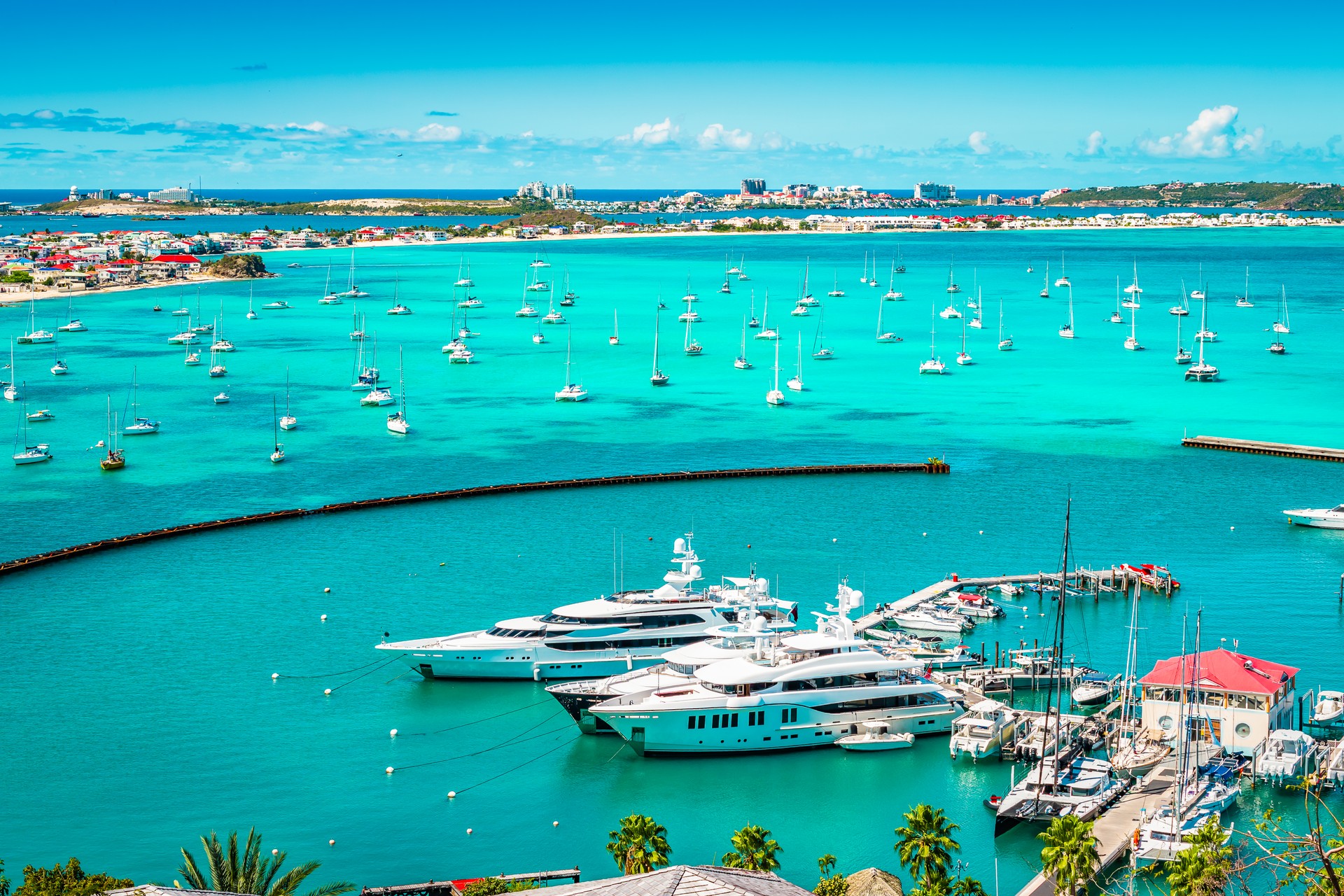 Luxury yachts and boats in the marina of Marigot, St Martin, Caribbean.